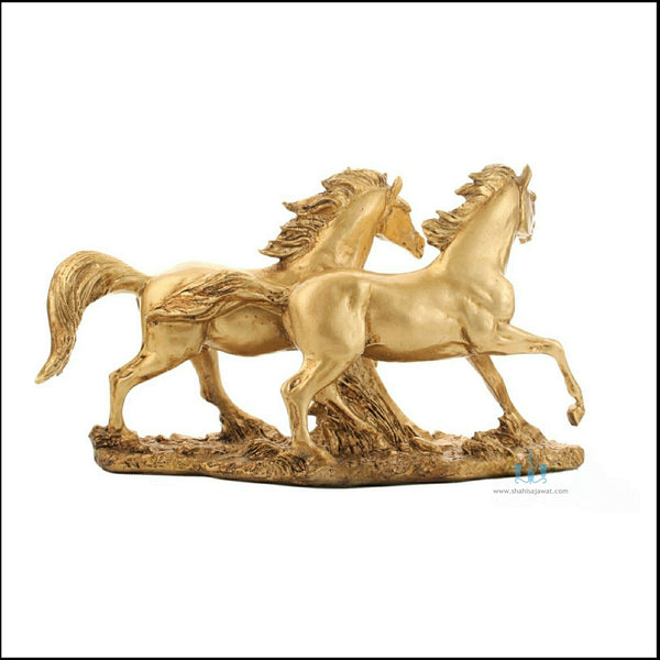 Gold Resin Twin Galloping Horses Tabletop Figurine, Available Exclusively On Shahi Sajawat India, the world of home decor products. Best trendy home decor, office decor, table decor living room, kitchen and bathroom decor ideas of 2023.