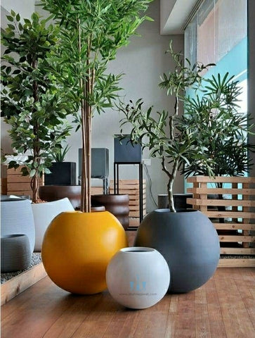 White/Black/Orange Large Globe Shaped  FRP (Fiberglass) Indoor And Outdoor Planters Are Lightweight, Durable, Weather Resistant, UV Resistant Made For Residential And Commercial Spaces, Available Exclusively On Shahi Sajawat India, the world of home decor products. Best trendy home decor, office decor, restaurant decor , hotel decor, airports, mall decor ideas of 2024.