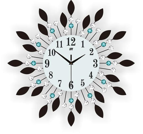 Large White Circular Metal+Glass Quartz Wall Clock with Blue & White Studs has a diameter of 36cm, needle display, abstract pattern,operates on 1*AA Battey & has a single face form & weighs 1000g, available exclusively on Shahi Sajawat India,the world of home decor products.Best home decor and living room decor ideas of 2020.
