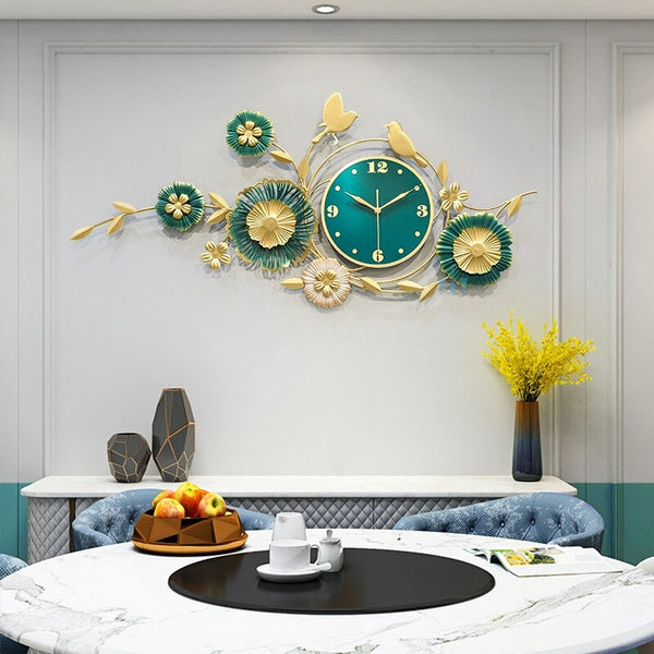 Green And Gold Flower And Birds Handcrafted Quartz Metal Wall Clock Is Asymmetrical And Horizontal With Single Face Form And Needle Display, available exclusively on Shahi Sajawat India, the world of home decor products.Best trendy home decor, office decor, restaurant decor, living room, kitchen and bathroom decor ideas of 2023.