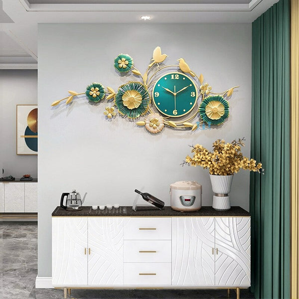 Green And Gold Flower And Birds Handcrafted Quartz Metal Wall Clock Is Asymmetrical And Horizontal With Single Face Form And Needle Display, available exclusively on Shahi Sajawat India, the world of home decor products.Best trendy home decor, office decor, restaurant decor, living room, kitchen and bathroom decor ideas of 2023.