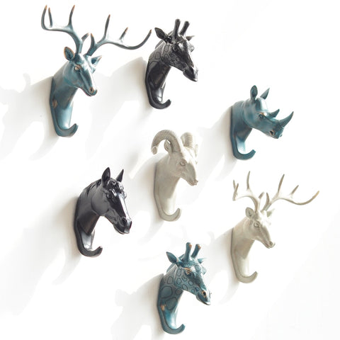 Animal figured Resin Wall Hanging Hooks of Pattern like animals, Deer,Goat,Giraffe,Rhinceros,Elephant and Horse.They are eco-friendly and available exclusively on Shahi Sajawat India, the world of home decor products.