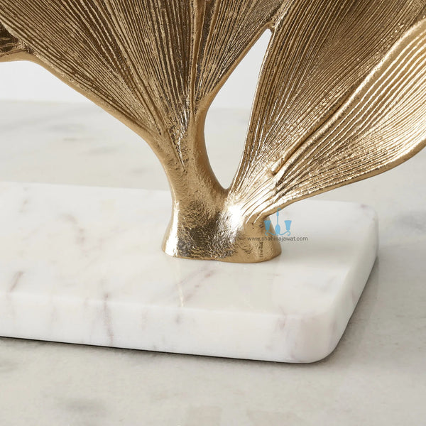 White And Gold Leaf Metal Table Top Handcrafted Sculpture (Figurine), Available exclusively on Shahi Sajawat India, the world of home decor products. Best trendy home decor, office decor, living room,table decor, kitchen and bathroom decor ideas of 2024.