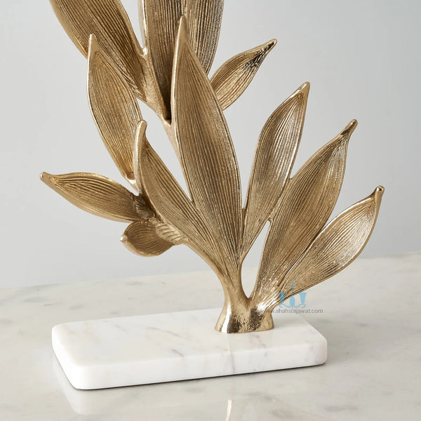 White And Gold Leaf Metal Table Top Handcrafted Sculpture (Figurine), Available exclusively on Shahi Sajawat India, the world of home decor products. Best trendy home decor, office decor, living room,table decor, kitchen and bathroom decor ideas of 2024.