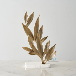 White And Gold Leaf Metal Table Top Handcrafted Sculpture (Figurine), Available exclusively on Shahi Sajawat India, the world of home decor products. Best trendy home decor, office decor, living room,table decor, kitchen and bathroom decor ideas of 2024.