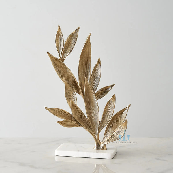 White And Gold Leaf Metal Table Top Handcrafted Sculpture (Figurine), Available exclusively on Shahi Sajawat India, the world of home decor products. Best trendy home decor, office decor, living room,table decor, kitchen and bathroom decor ideas of 2024.