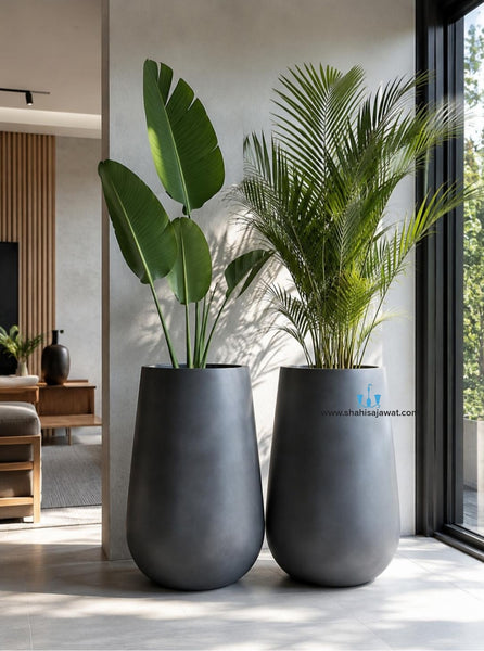 Black Vase Shaped FRP (Fiberglass) Indoor And Outdoor Planters Are Lightweight, Durable, Weather Resistant, UV Resistant Made For Residential And Commercial Spaces, Available Exclusively On Shahi Sajawat India, the world of home decor products. Best trendy home decor, office decor, restaurant decor, malls, airports, hotels and resort decor ideas of 2026.