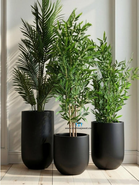 Black Cylinder Shaped FRP (Fiberglass) Indoor And Outdoor Planters Are Lightweight, Durable, Weather Resistant, UV Resistant Made For Residential And Commercial Spaces, Available Exclusively On Shahi Sajawat India, the world of home decor products. Best trendy home decor, office decor, restaurant decor, hotel decor, airports, mall decor ideas of 2026.
