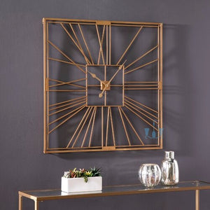 Large Gold Square Quartz Metal Wall Clock With Roman Numerals, With Single Face Form And Needle Display, available exclusively on Shahi Sajawat India, the world of home decor products. Best trendy home decor, living room, kitchen, office, restaurant and bathroom decor ideas of 2023.