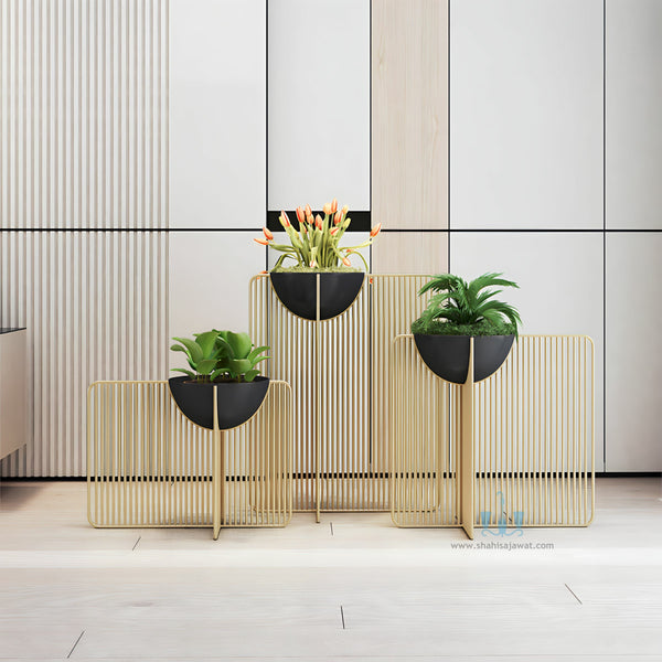 Black/Gold Modern Sleek Handcrafted (Metal) Floor Indoor Planters With Iron Rail Stand And Oval Pot, Available Exclusively On Shahi Sajawat India, the world of home decor products. Best trendy home decor, office decor, restaurant decor living room, kitchen and bathroom decor ideas of 2023.