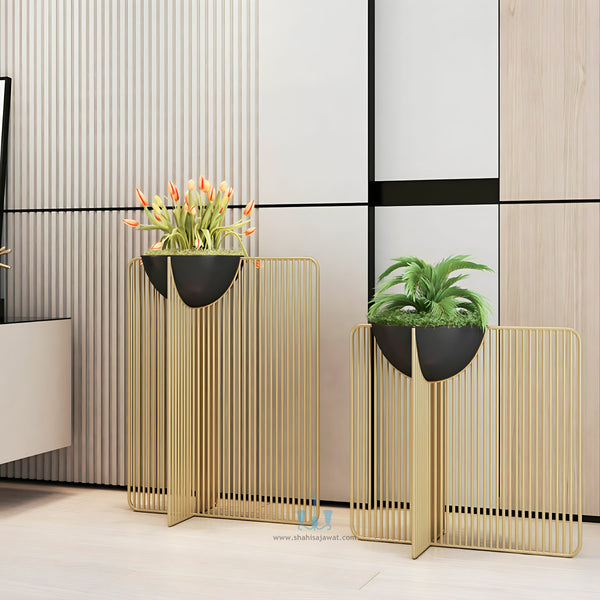 Black/Gold Modern Sleek Handcrafted (Metal) Floor Indoor Planters With Iron Rail Stand And Oval Pot, Available Exclusively On Shahi Sajawat India, the world of home decor products. Best trendy home decor, office decor, restaurant decor living room, kitchen and bathroom decor ideas of 2023.