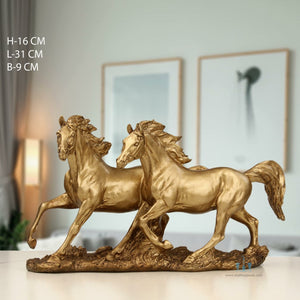Gold Resin Twin Galloping Horses Tabletop Figurine, Available Exclusively On Shahi Sajawat India, the world of home decor products. Best trendy home decor, office decor, table decor living room, kitchen and bathroom decor ideas of 2023.