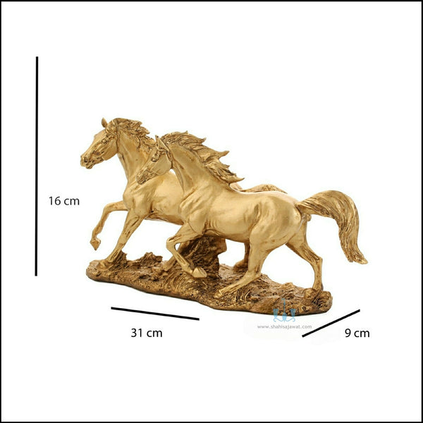 Gold Resin Twin Galloping Horses Tabletop Figurine, Available Exclusively On Shahi Sajawat India, the world of home decor products. Best trendy home decor, office decor, table decor living room, kitchen and bathroom decor ideas of 2023.