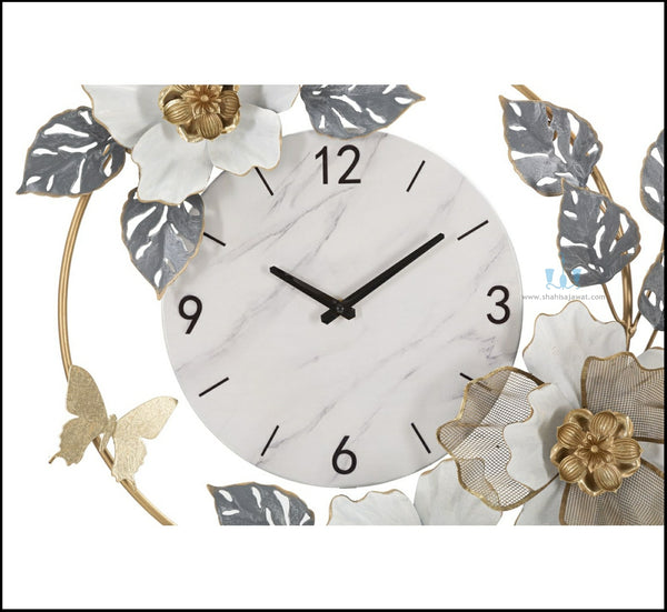 Grey, White And Gold Romantic Garden Floral Handcrafted Quartz Metal (Iron) Circular Wall Clock With Single Face Form And Needle Display, available exclusively on Shahi Sajawat India, the world of home decor products.Best trendy home decor, office decor, restaurant decor, living room, kitchen and bathroom decor ideas of 2024.