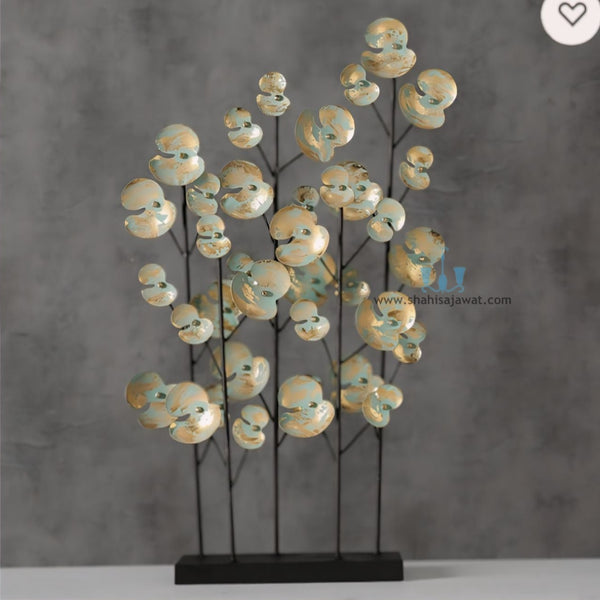 Pastel Green And Gold Floral Metal Table Top Handcrafted Sculpture (Figurine), Available exclusively on Shahi Sajawat India, the world of home decor products. Best trendy home decor, office decor, living room,table decor, kitchen and bathroom decor ideas of 2024.