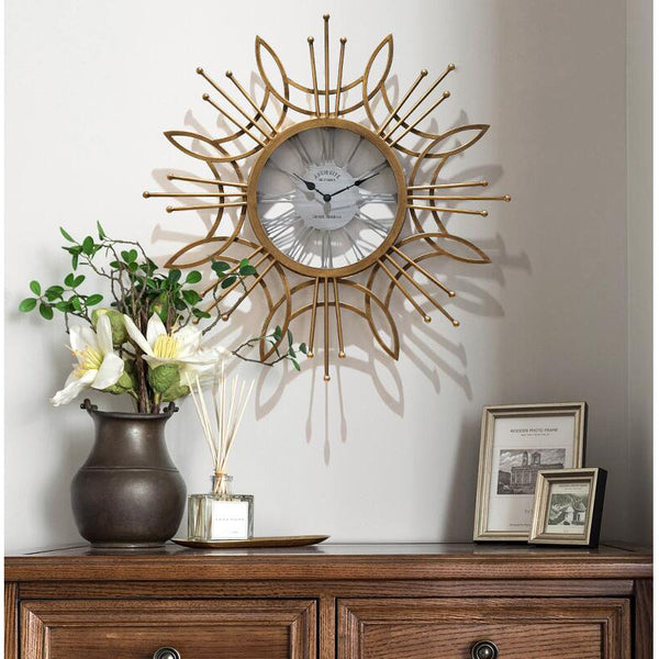 Large Golden Metal Circular Quartz Wall Clock With Needle Display, Abstract Pattern, Has 30mm Thick Plate, Single Face Form, Of Size 79.5x79.5x3.5cm/31.3x31.3x1.4inch Is Powered By: AA 1.5V Battery, available exclusively on Shahi Sajawat India,the world of home decor products.Best trendy home decor, living room and kitchen decor ideas of 2020.