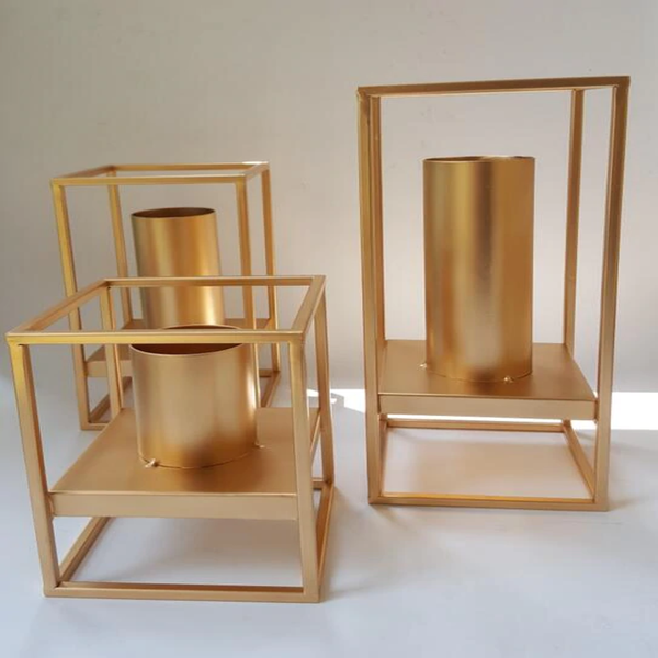 Gold Metal Vases In The Form Of Rack And Cylindrical Vase That Are Non Separable, In Large, Medium And Small Size, available exclusively on Shahi Sajawat India, the world of home decor products.Best trendy home decor, living room, kitchen and bathroom decor ideas of 2021.