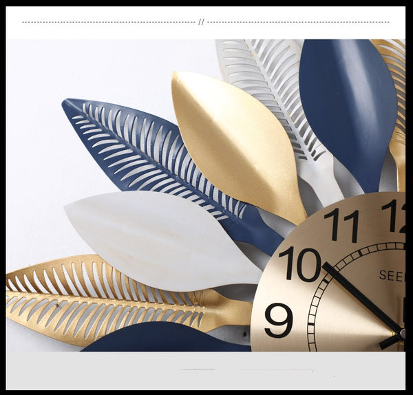 Large Golden/Blue Wrought Iron Wall Clocks With Leafy Patterns Are Circular Shaped, Quartz, has a Needle Display, in 2 Sizes Of 52×52cm and 60×60cm, powered by 1×AA Battery, available exclusively on Shahi Sajawat India, the world of home decor products.Best trendy home decor, living room and kitchen decor ideas of 2020.