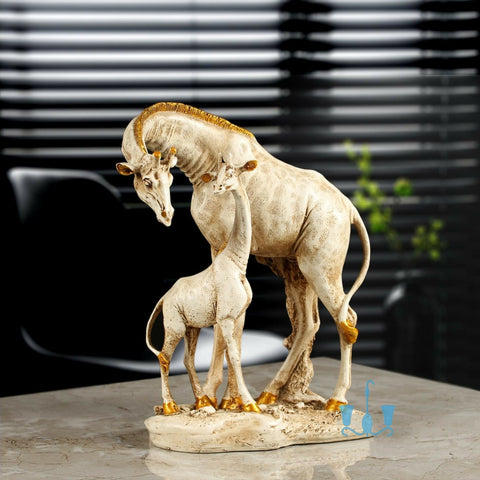 White And Gold Resin Giraffe Mother And Baby Figurine Of Size 30×23×15cm, Available Exclusively On Shahi Sajawat India, the world of home decor products. Best trendy home decor, office decor, table decor living room, kitchen and bathroom decor ideas of 2022.