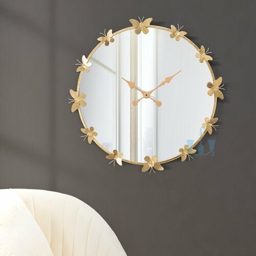 Large Gold Butterfly And Mirror Quartz Handcrafted Metal (Wrought Iron) Wall Clock Of Size 75×75cm, With Single Face Form And Needle Display, available exclusively on Shahi Sajawat India, the world of home decor products.Best trendy home decor, office decor, restaurant decor, living room, kitchen and bathroom decor ideas of 2022.