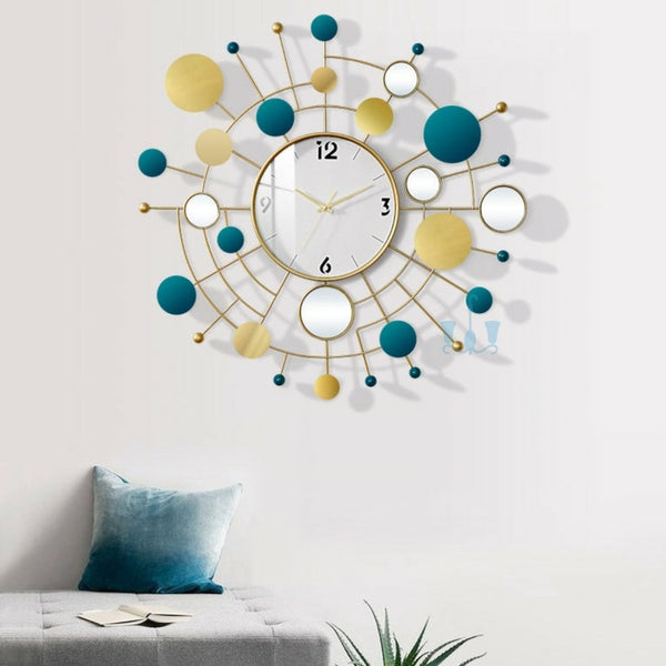 Blue And Gold Multidisc Geometric Handcrafted Quartz Metal (Wrought Iron) Wall Clock Of Size 67×78cm, With Single Face Form And Needle Display, available exclusively on Shahi Sajawat India, the world of home decor products.Best trendy home decor, office decor, restaurant decor, living room, kitchen and bathroom decor ideas of 2022.