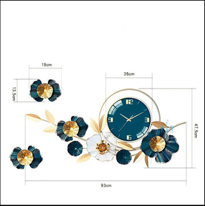 Blue Gold/White Gold Floral And Leaves Handcrafted Quartz Metal (Wrought Iron) Wall Clock Is Asymmetrical And Horizontal With Single Face Form And Needle Display, available exclusively on Shahi Sajawat India, the world of home decor products.Best trendy home decor, office decor, restaurant decor, living room, kitchen and bathroom decor ideas of 2022.