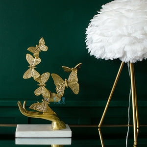 Gold Rising Butterfly From Open Hands Metal Table Top Handcrafted Sculpture (Figurine), Available exclusively on Shahi Sajawat India, the world of home decor products. Best trendy home decor, office decor, living room,table decor, kitchen and bathroom decor ideas of 2022.