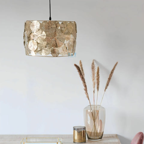 Gold Handcrafted Etched Lotus Leaves Metal Drum Pendant Light With E27 Base Type, AC Power Source and Voltage Of 90-260V, available exclusively on Shahi Sajawat India,the world of home decor products.Best trendy home decor, office, restaurant, living room and kitchen decor ideas of 2023.
