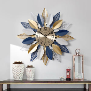 Large Golden/Blue Wrought Iron Wall Clocks With Leafy Patterns Are Circular Shaped, Quartz, has a Needle Display, in 2 Sizes Of 52×52cm and 60×60cm, powered by 1×AA Battery, available exclusively on Shahi Sajawat India, the world of home decor products.Best trendy home decor, living room and kitchen decor ideas of 2020.