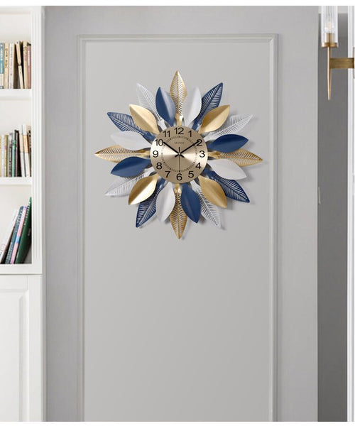 Large Golden/Blue Wrought Iron Wall Clocks With Leafy Patterns Are Circular Shaped, Quartz, has a Needle Display, in 2 Sizes Of 52×52cm and 60×60cm, powered by 1×AA Battery, available exclusively on Shahi Sajawat India, the world of home decor products.Best trendy home decor, living room and kitchen decor ideas of 2020.