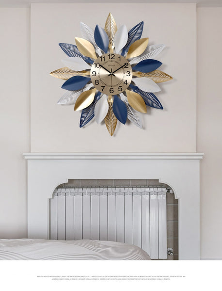 Large Golden/Blue Wrought Iron Wall Clocks With Leafy Patterns Are Circular Shaped, Quartz, has a Needle Display, in 2 Sizes Of 52×52cm and 60×60cm, powered by 1×AA Battery, available exclusively on Shahi Sajawat India, the world of home decor products.Best trendy home decor, living room and kitchen decor ideas of 2020.