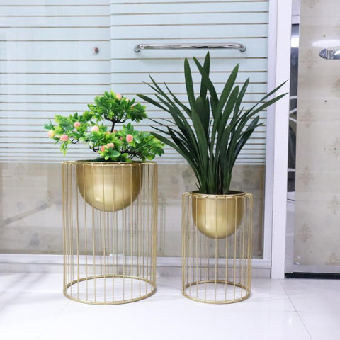 Gold Swing Nordic Wrought Iron Floor Planters in Large And Small Sizes, available exclusively on Shahi Sajawat India, the world of home decor products. Best trendy home decor, living room, kitchen and bathroom decor ideas of 2020.