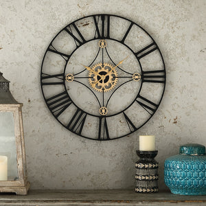 Black And Gold Circular Quartz Roman Metal Wall Clock Of Size 60×60cms, With Needle Display And Single Face Form, available exclusively on Shahi Sajawat India, the world of home decor products.Best trendy home decor, living room, kitchen and bathroom decor ideas of 2021.