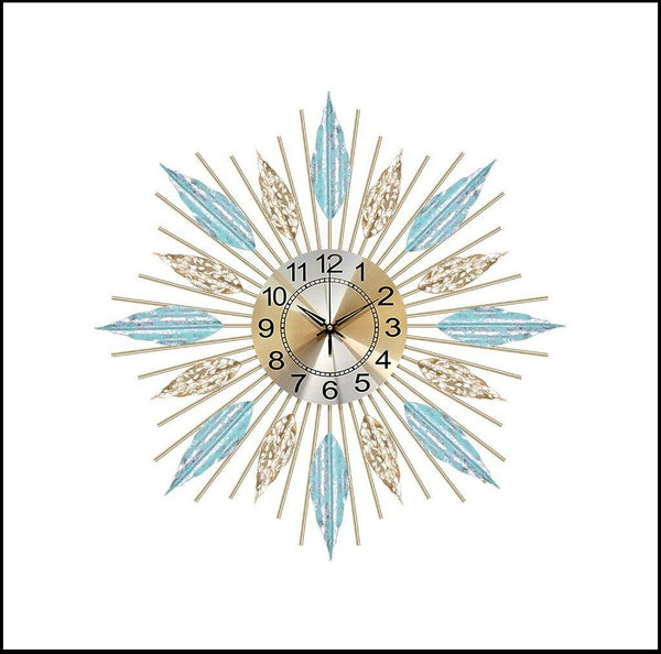 Blue And Gold Circular Quartz Metal Wall Clock Of Size 68×22cm With Leaves Design, Needle Display, Arabic Numerals And Single Face Form, available exclusively on Shahi Sajawat India, the world of home decor products.Best trendy home decor, living room, kitchen and bathroom decor ideas of 2021.