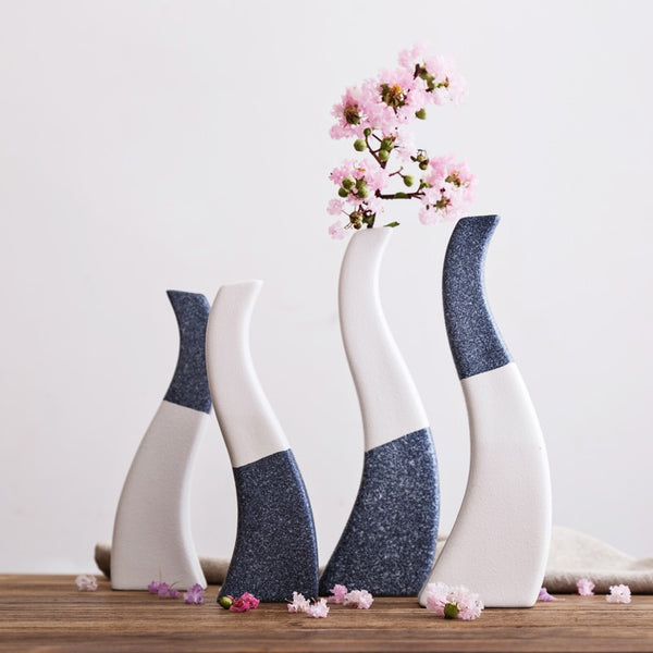 Blue/White Snowflake Glazed Ceramic Tabletop Vases Of Large Size (24×7cm) and Small Size ( 20×6.3cm), available exclusively on Shahi Sajawat India,the world of home decor products.Best trendy home decor, living room and kitchen decor ideas of 2019.