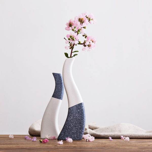 Blue/White Snowflake Glazed Ceramic Tabletop Vases Of Large Size (24×7cm) and Small Size ( 20×6.3cm), available exclusively on Shahi Sajawat India,the world of home decor products.Best trendy home decor, living room and kitchen decor ideas of 2019.