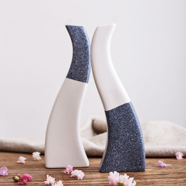 Blue/White Snowflake Glazed Ceramic Tabletop Vases Of Large Size (24×7cm) and Small Size ( 20×6.3cm), available exclusively on Shahi Sajawat India,the world of home decor products.Best trendy home decor, living room and kitchen decor ideas of 2019.