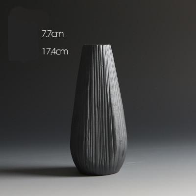 Black Textured Ceramic Vases In 3 Different Size And Shapes,Style 1 ( 11×7.5cm ), Style 2 ( 23×8.7cm ), Style 3 ( 17.4×7.7cm ),available exclusively on Shahi Sajawat India,the world of home decor products.Best trendy home decor and living room decor ideas of 2019.