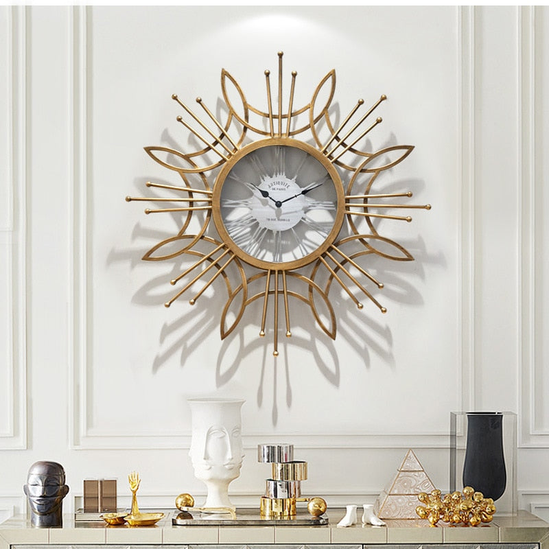 Large Golden Metal Circular Quartz Wall Clock With Needle Display, Abstract Pattern, Has 30mm Thick Plate, Single Face Form, Of Size 79.5x79.5x3.5cm/31.3x31.3x1.4inch Is Powered By: AA 1.5V Battery, available exclusively on Shahi Sajawat India,the world of home decor products.Best trendy home decor, living room and kitchen decor ideas of 2020.