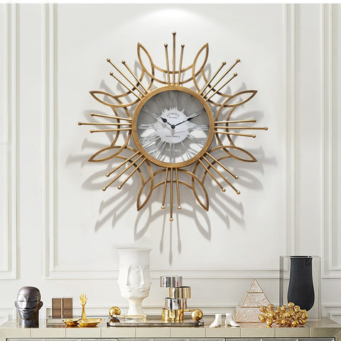 Large Golden Metal Circular Quartz Wall Clock With Needle Display, Abstract Pattern, Has 30mm Thick Plate, Single Face Form, Of Size 79.5x79.5x3.5cm/31.3x31.3x1.4inch Is Powered By: AA 1.5V Battery, available exclusively on Shahi Sajawat India,the world of home decor products.Best trendy home decor, living room and kitchen decor ideas of 2020.